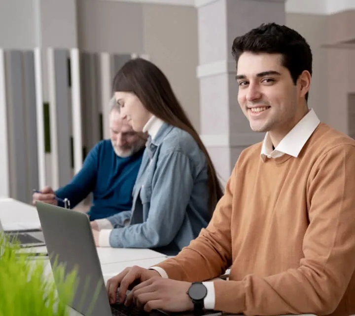 Professional woman working on a laptop during Azure certification training